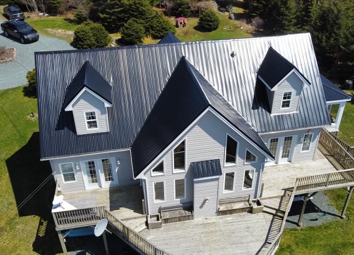 Asphalt gray colored shingles on a residential home installed by P&P Roofing