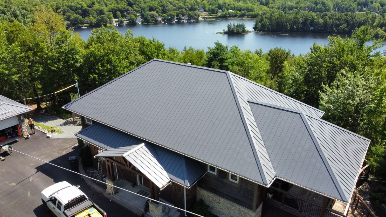Asphalt gray colored shingles on a residential home installed by P&P Roofing
